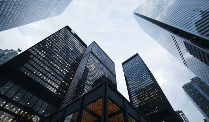 low angle photo of city high rise buildings during daytime